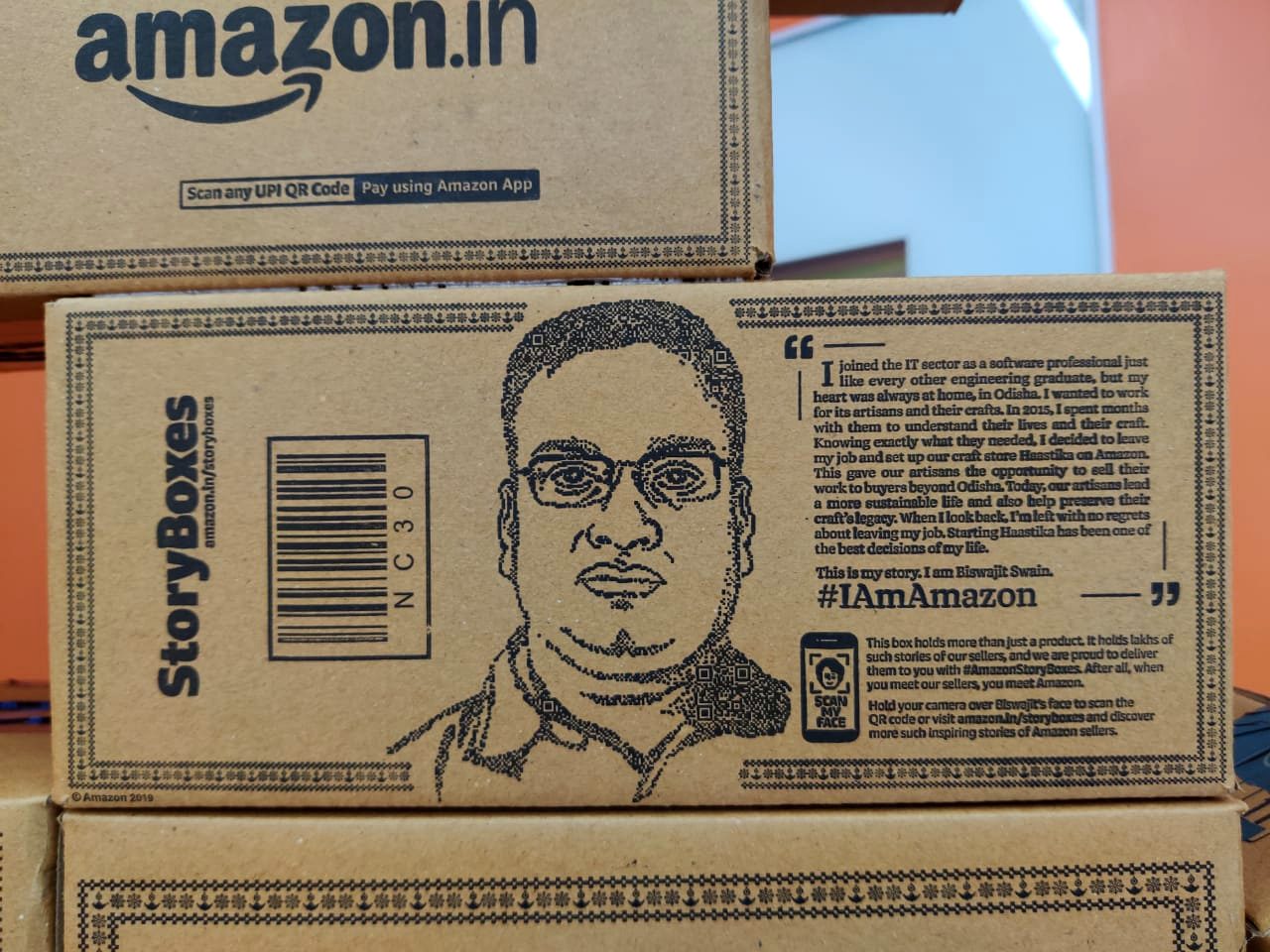 Amazon StoryBox printed with Haastika founder Biswajit Swain's portrait and story