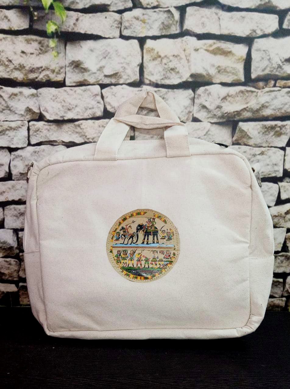 Canvas laptop bag with hand-painted pattachitra art medallion